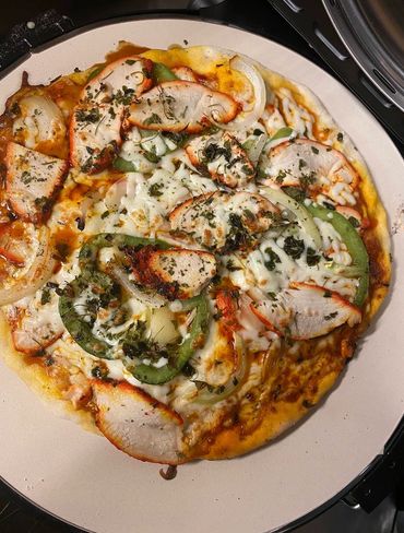 Flatbread Pizza: Fresh Flavours, New Cravings! Choose between lightly spiced Chicken Tikka or creamy