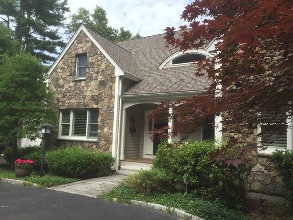 House with asphalt shingle roof