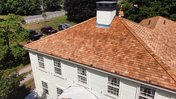 Home with beautiful cedar shingle roof