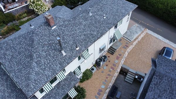 Home with asphalt shingle roof