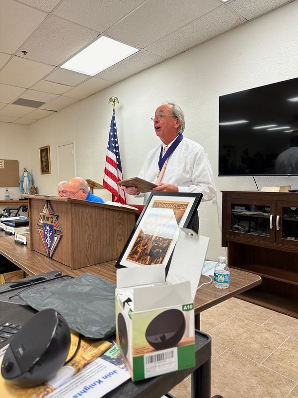 Sir Grand Knight Leo addressing Council 4934 during our monthly meeting, May 2024.