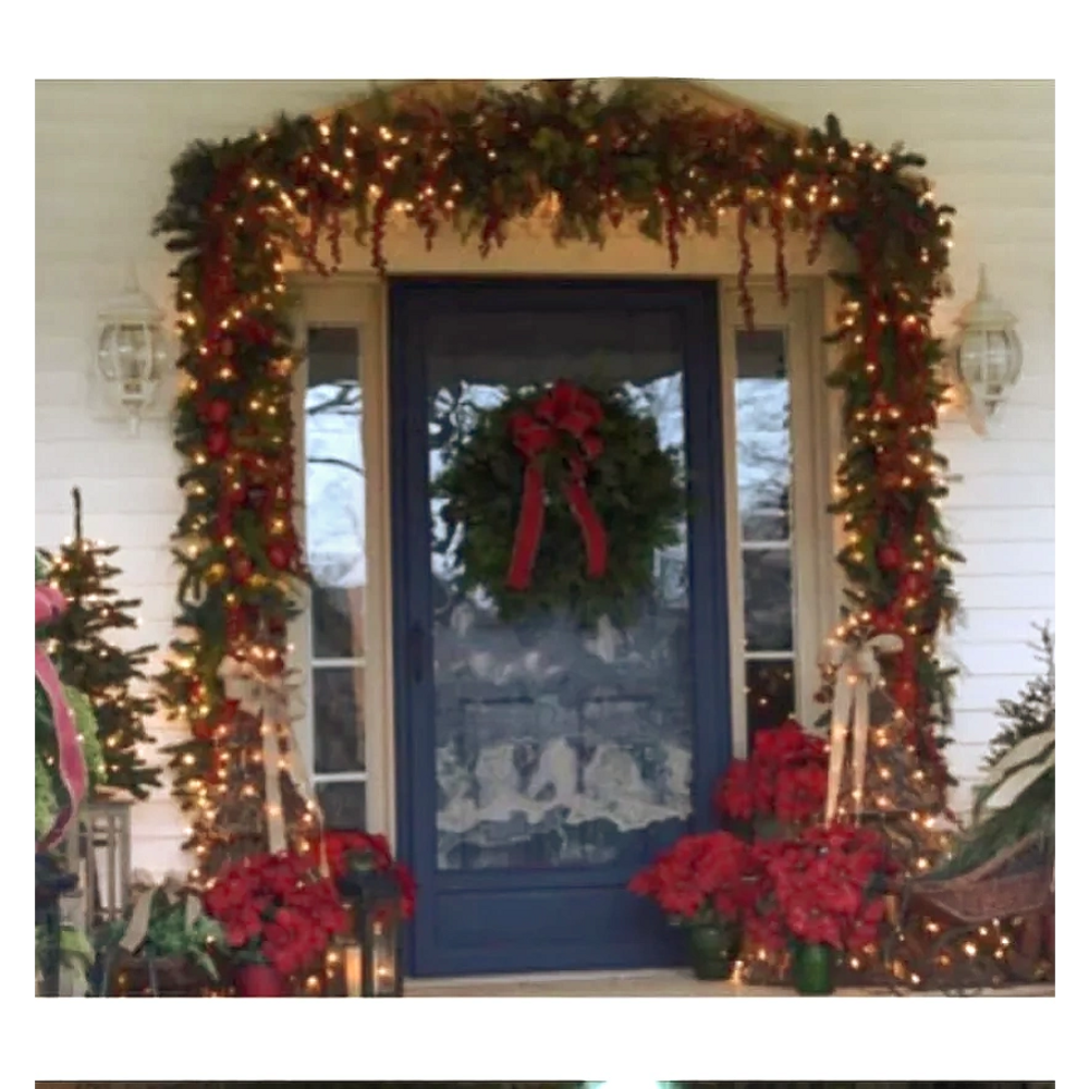 Front Exterior Entrance with Green garland and Christmas decoration.