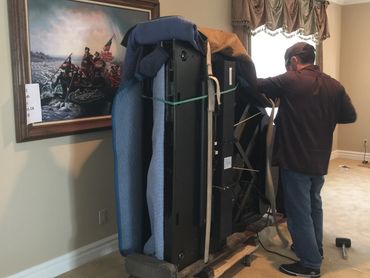 Moving a Grand piano requires disassemble, properly prepped, wrapped and loaded for safe transport