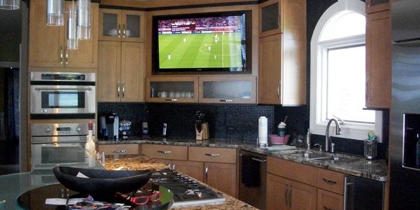 Custom kitchen cabinets with built in television in Louisville, Kentucky