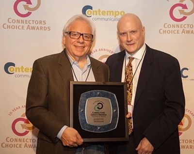Dr. Mike Vacante and Gary Naherny of the Mike Petrone Band receiving an award in 2016.