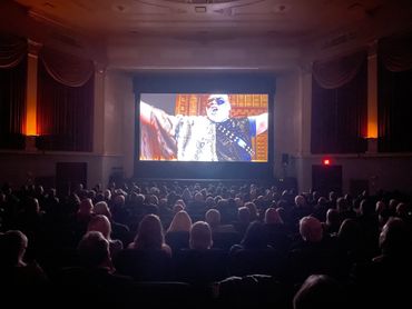 The film Caesar The Musical showing to a packed house at the Capitol Theater in Cleveland.
