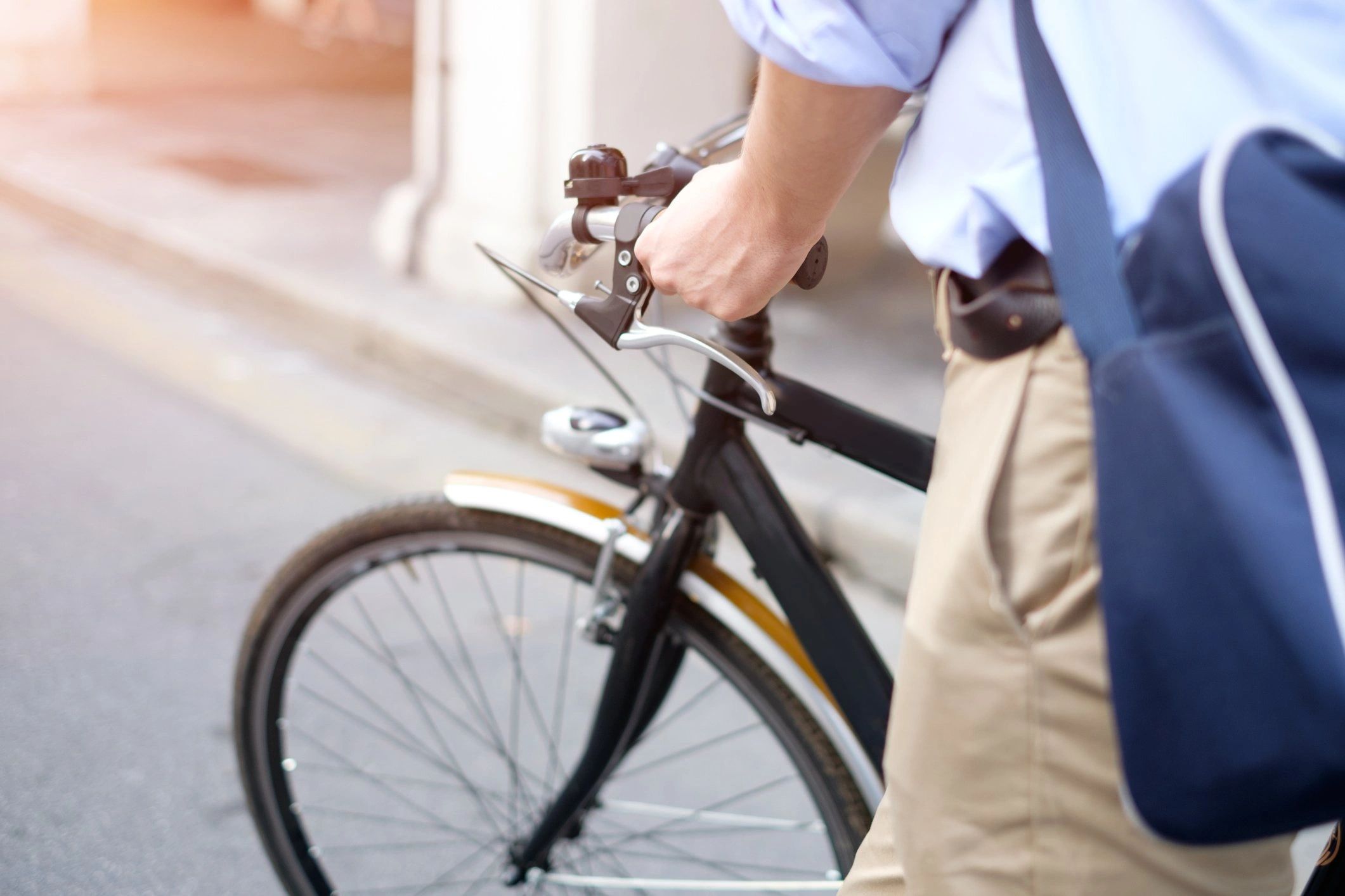 A close up of a cyclist on their bike. Cycling to work.