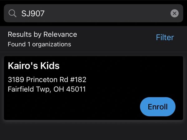 Search result showing one organization named Kairo's Kids with address and enroll option.
