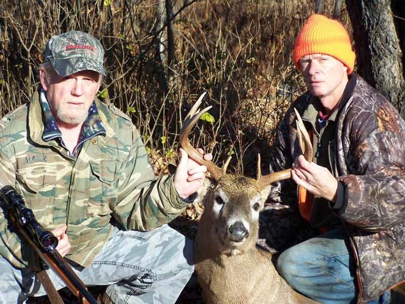 Ken and Dale with a nice 10 pt. whitetail buck 

