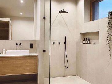Emergency plumber repair for leaking walk-in shower and bathroom pipework in London