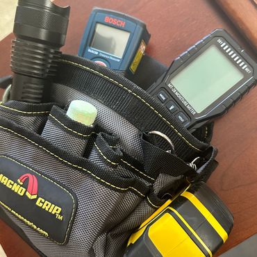 Tools of the trade, moisture meters and laser measurements help ensure accurate damage assessments.