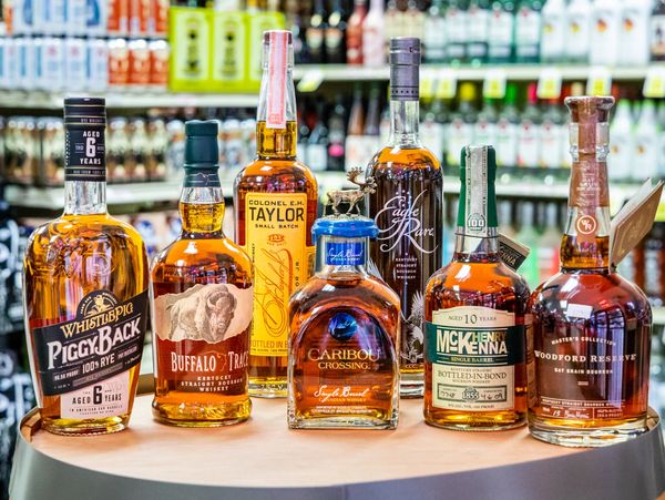 closeup shot of liquor bottles on a table