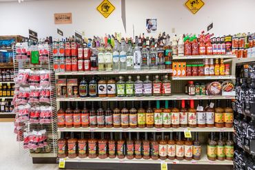 Customer shopping in the beverage aisle at Snow's Family Market