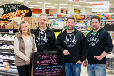 Snow's Family Market team members inside the store