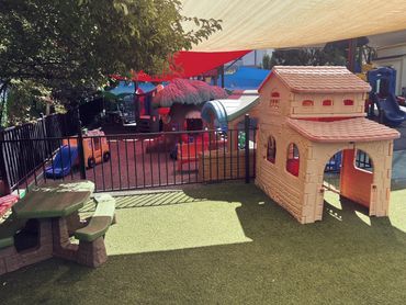 Little Prodigy Preschool Play area with picnic bench and play house