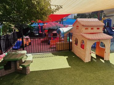 Little Prodigy Preschool Play area with picnic bench and play house
