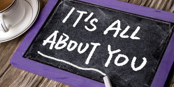 It's All About You signage.