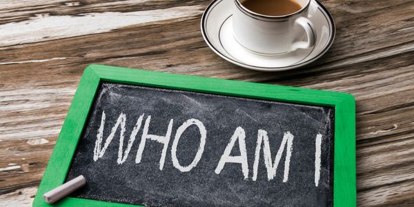 A sign that says who am I.