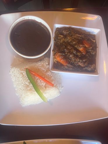 Mouth watering Legumes served with rice and black beans sauce