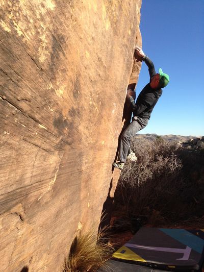 Mike Papciak bouldering in the Nevada desert. Photo: Ethan Pringle.