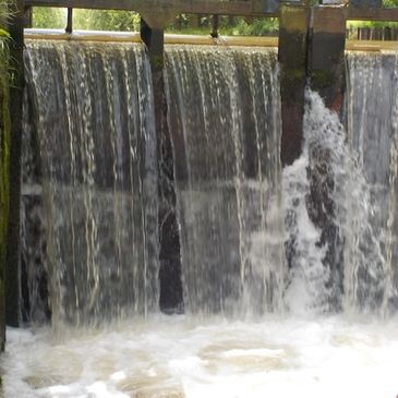 Water spilling into lock