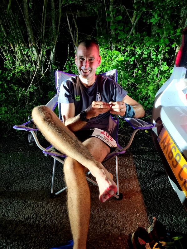 Foot maintenance during a wet Centurion Running North Downs Way 100 mile ultra marathon.