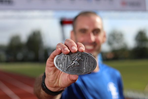 The finisher’s buckle from my first-ever 100-mile ultra marathon.
