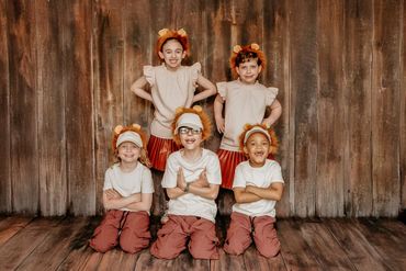 Five Grit Athletes Dancers posing in their costumes