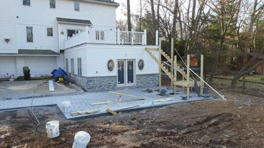 Stairs going in, and new posts and spindles are ready.