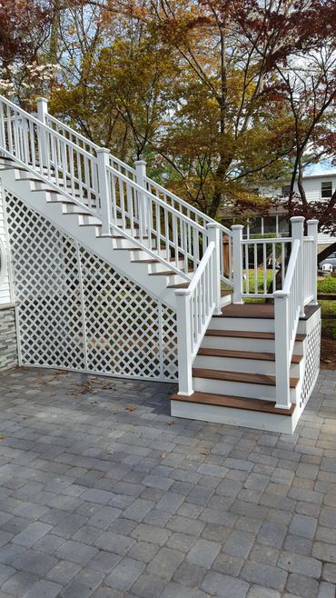 Beautiful stairs with white lattice decoration.