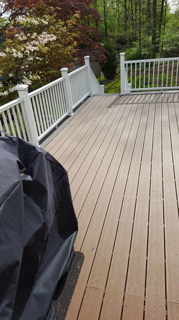 Beautiful Trex decking and spindles with a picture boarder for a little dimension.