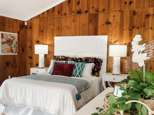 master bedroom real estate listing accessories and furniture bed lamps artwork