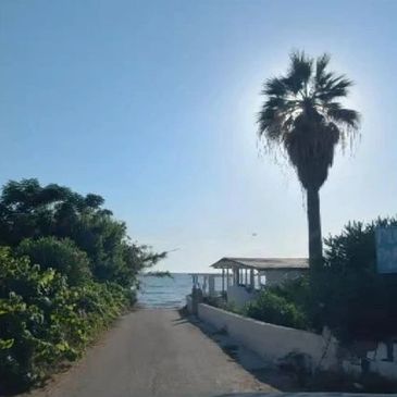 Find hidden places such as Kardiki Castle. Take a drink at Taverna PLORI in Skala.