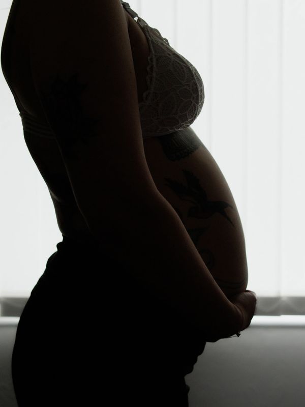 Pregnant woman coming for treatment with Natal Balance