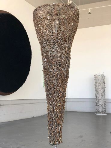 Full length image of floor sculpture "Calculated Chaos."