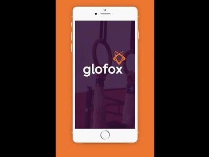 Image of a mobile phone displaying the Glofox Gym management interface.
