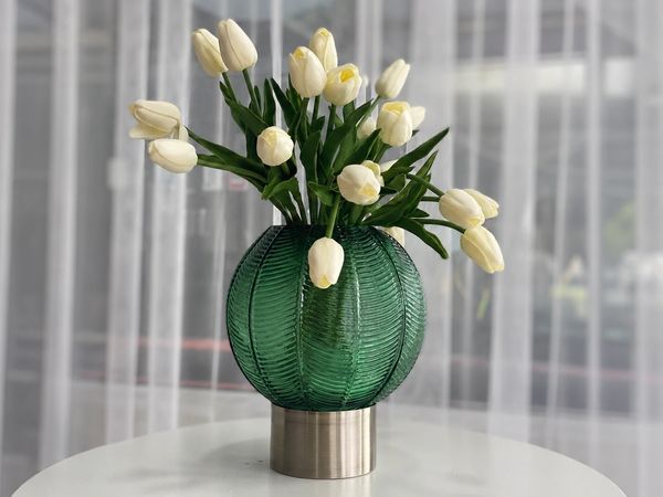 Elegant flower arrangement in a decorative vase