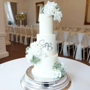 luxury three tier white wedding cake
