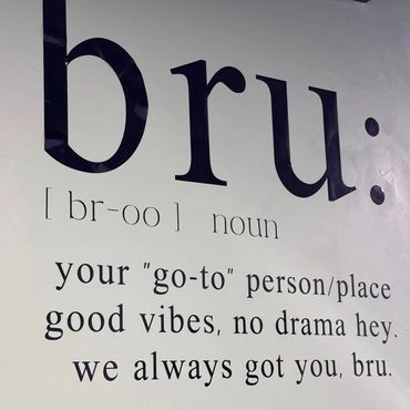 Wall art defining 'bru' as a supportive, drama-free friend or place with good vibes.