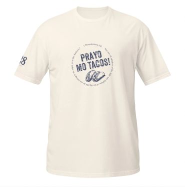 White t-shirt with 'Prayo Mo Tacos!' and taco graphics in navy blue.