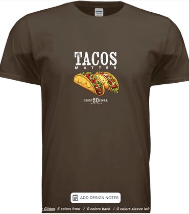 Brown T-shirt with 'Tacos Matter' and two colorful taco illustrations.
