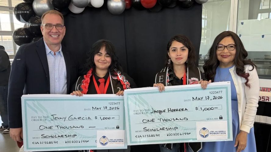 Robertson Legacy Foundation scholarship recipients holding awards with local community partners.