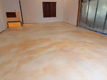 Empty room with newly installed marble epoxy floor.