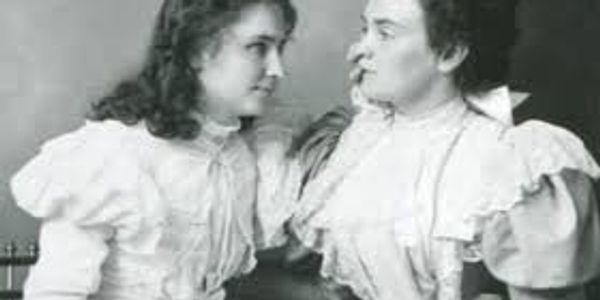 Two woman looking each other