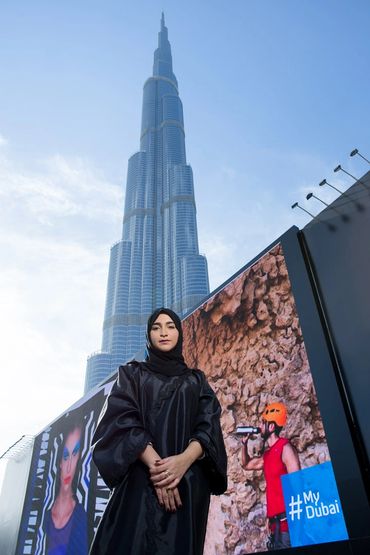 Portrait of a lady in front of the Burj Khalifa in Dubai. Simon White Photography