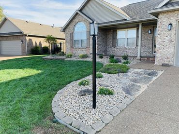 Landscape renovation, rock replaced mulch, Newburgh, IN