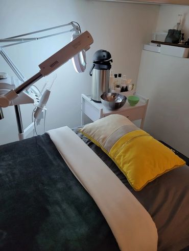 close up: Massage bed with facial machines