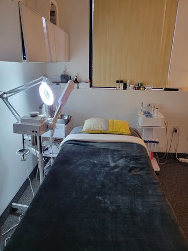 Massage bed with facial machines