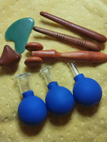 picture of deep tissue tools, massaging tools and cupping treatment tools