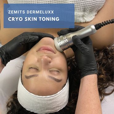 Woman enjoying the Cryo skin toning wand on the DermeLuxx machine